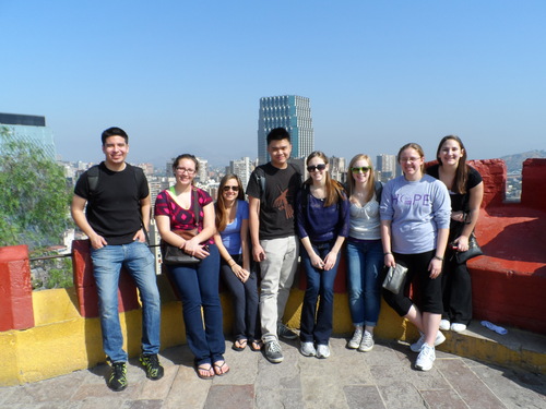 Nursing students pose on rooftop in Santiago, Chile