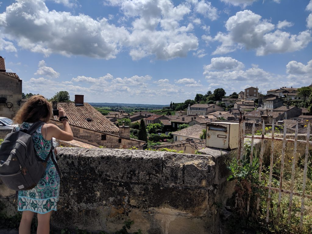 Xiomara Matathias taking a picture of historic homes in France.