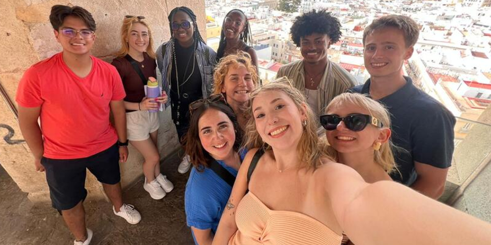UMass Lowell students take a group selfie in Cadiz, Spain.