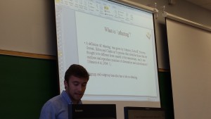 Swansea University student Luke Walker presenting his research findings