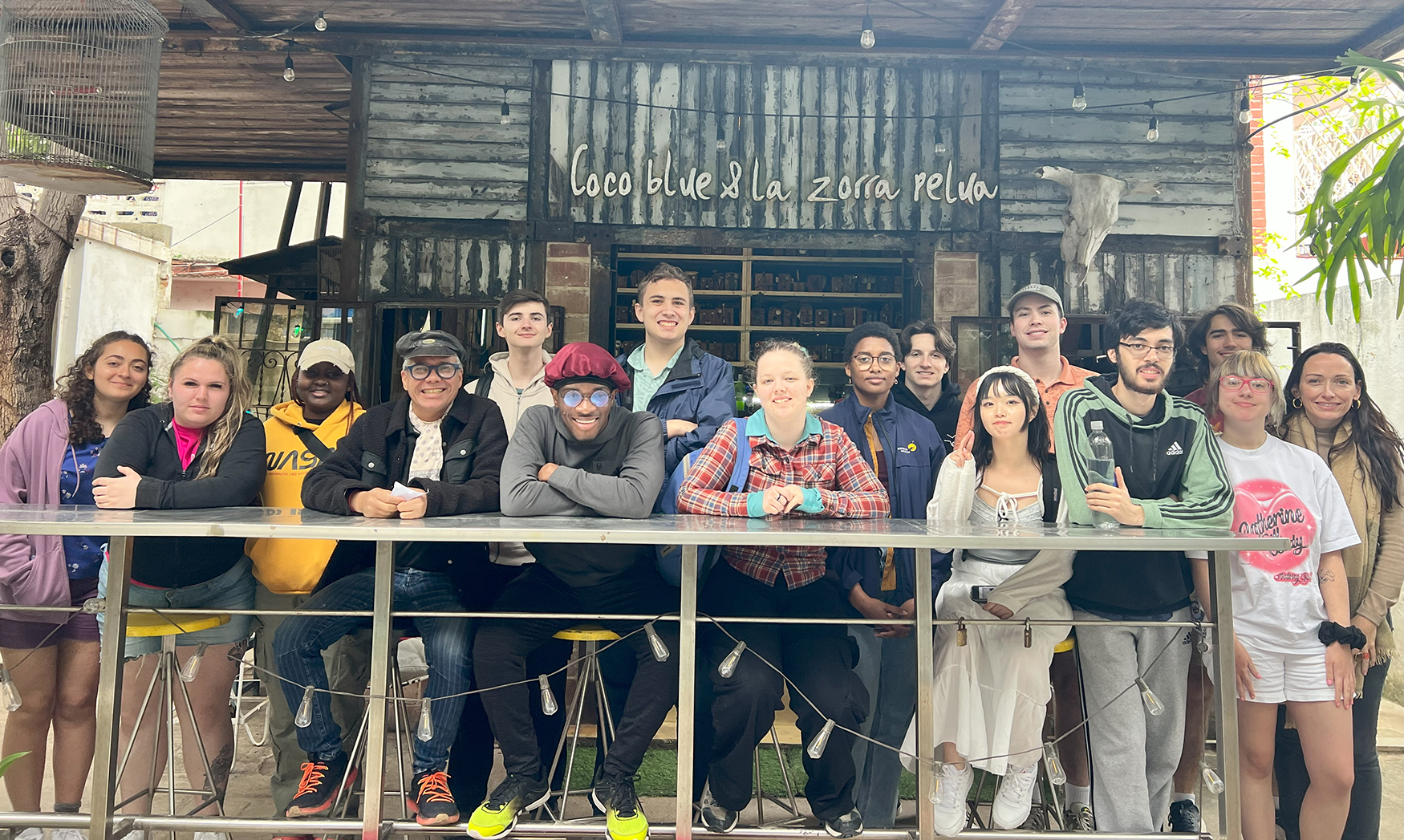 Students pose for a photo at the restaurant Coco Blue.