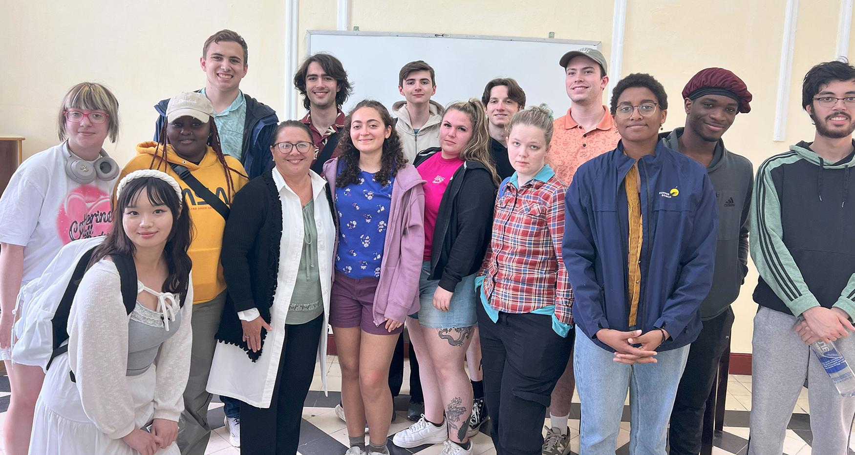 A group of students pose for a picture in a policlinic.