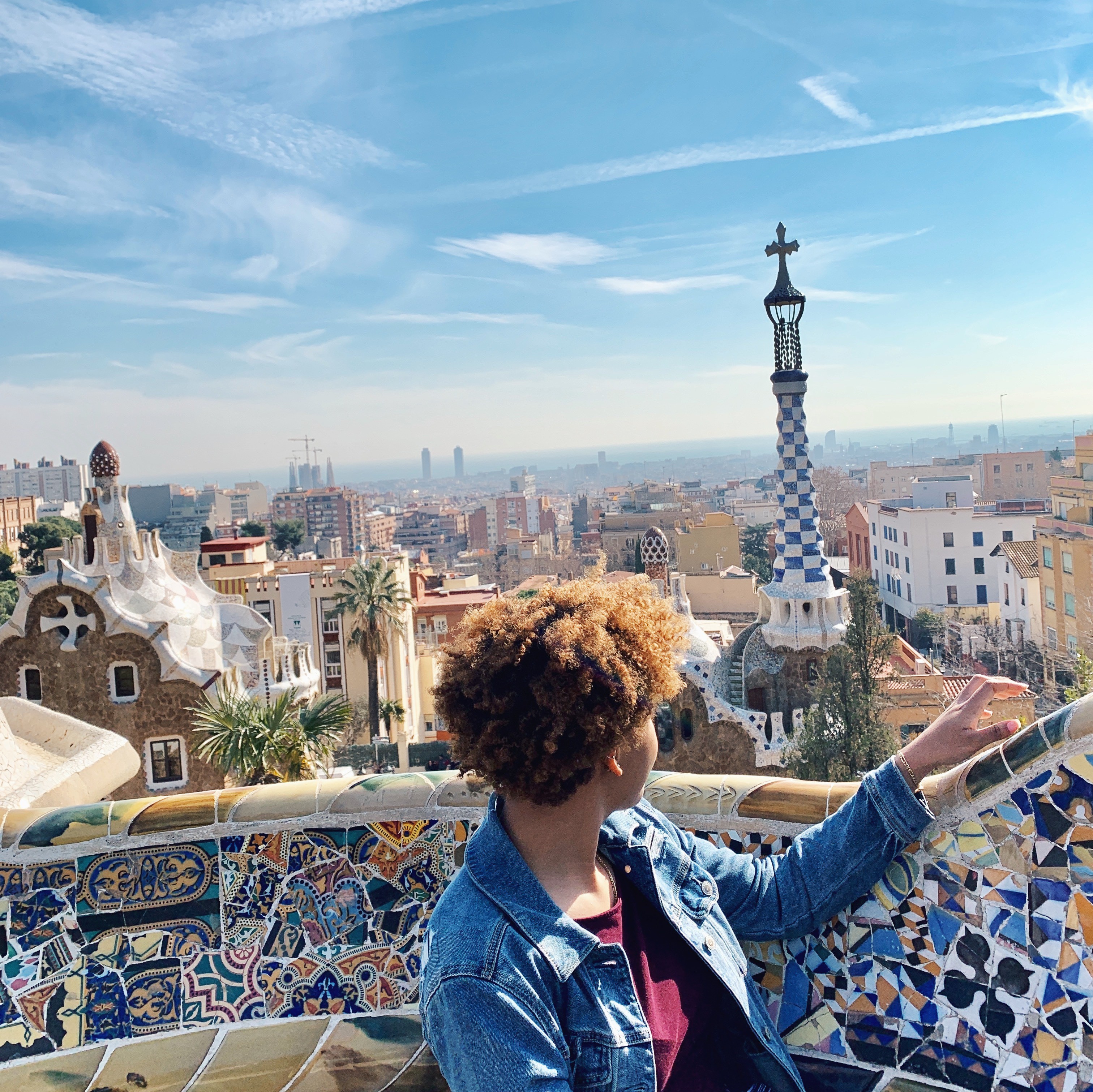 Luzmia Ligonde looks out across Barcelona cityscape.