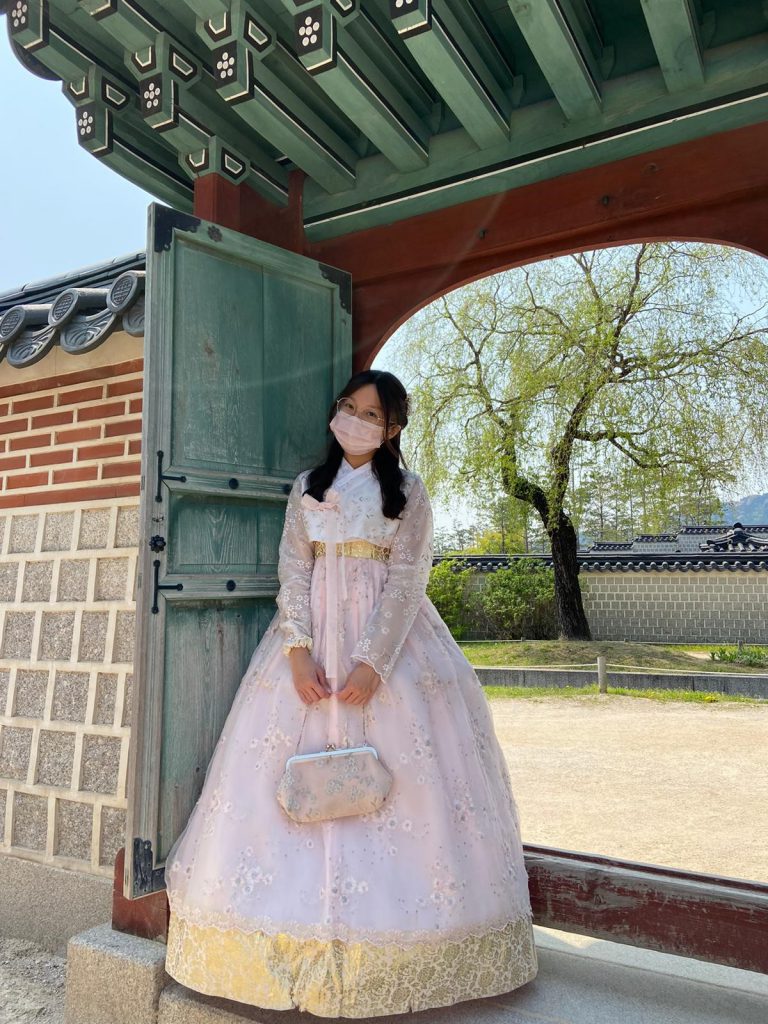 Trang Vy Bui poses for a picture at the palace in Seoul, South Korea.